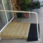 Photo of small timber ramp with handrail