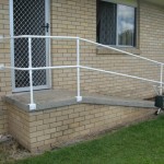 Photo of handrail at landing and stairs